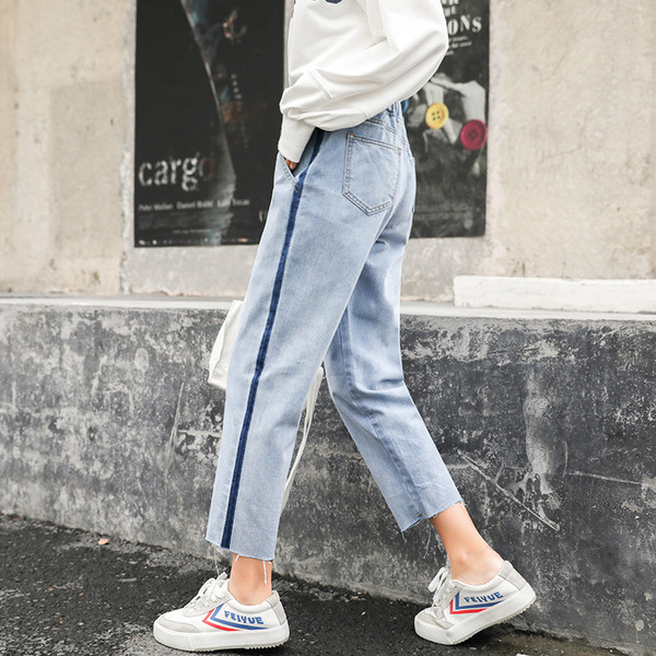 Blugi de dama cu talie inalta si dungi in doua culori