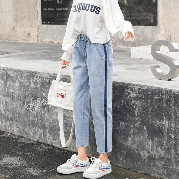 Blugi de dama cu talie inalta si dungi in doua culori