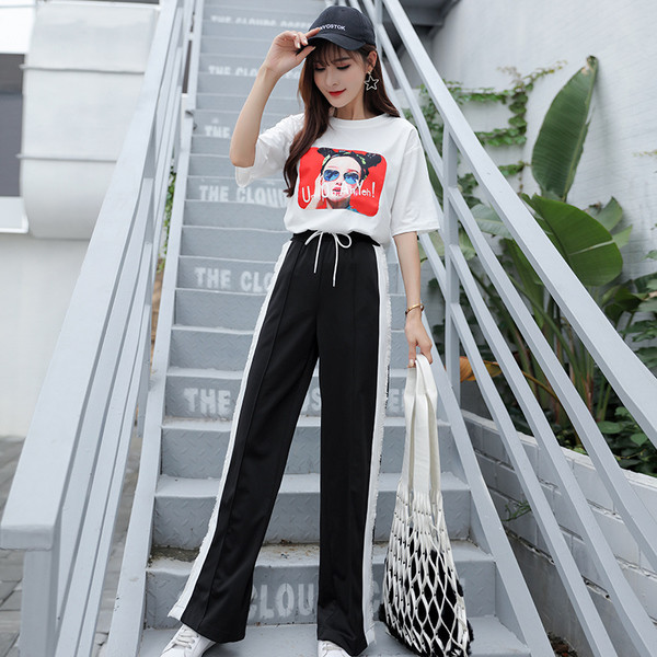 Pantaloni sport de damă în negru și roșu