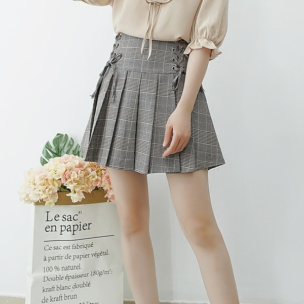 Карирана дамска пола с висока талия и връзки в четири цвята