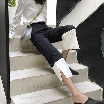 Дамски панталон в черно-бял цвят с 7/8 дължина и висока талия