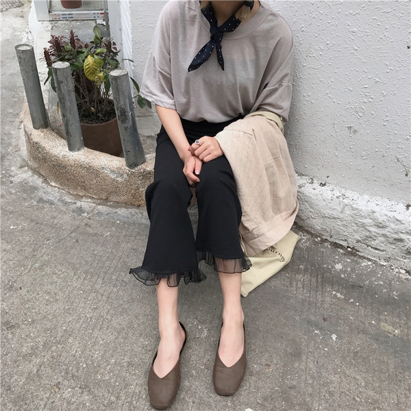 Fekete női nadrág széles modellje