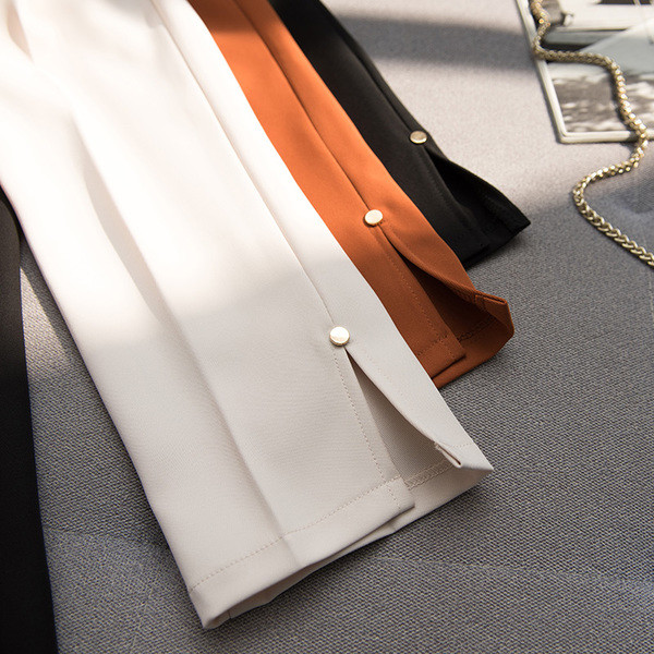 Sportos és elegáns női nadrág fehér, fekete és barna színekben