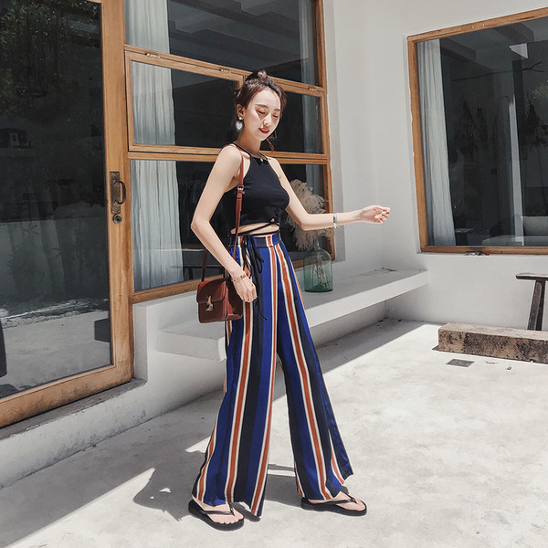 Női csíkos nadrág magas derékkal - széles modell