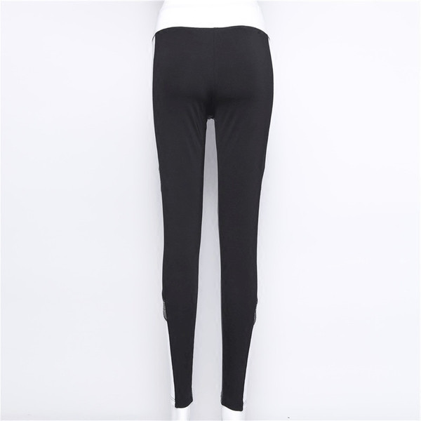 Jambiere sport de damă în negru cu inscripție și elemente transparente