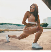 Echipă modernă de sport feminin, inclusiv jambiere și bustieră