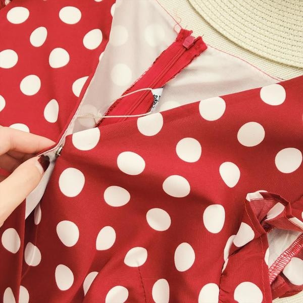 Γυναικεία ολόσωμη φόρμα  πουά σε λευκό και κόκκινο χρώμα