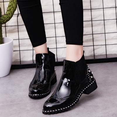 Γυναικείες μπότες μαύρες με μεταλλικά τρουξ δύο μοντέλα