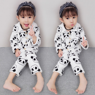 Children`s pajamas for a girl with applications in white and pink