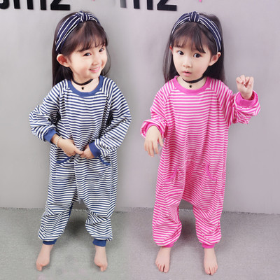 Striped children`s pajamas for a girl with a zipper and pockets in blue and red