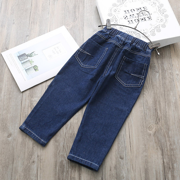 Blugi pentru copii pentru o fata cu talie inalta si broderii intr-o culoare inchisa