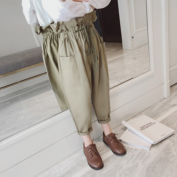 Pantaloni la modă în două culori pentru fete