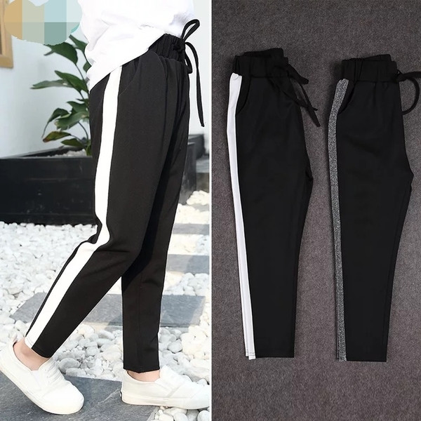 Fekete színű, rugalmas derekú gyereknadrág lányoknak