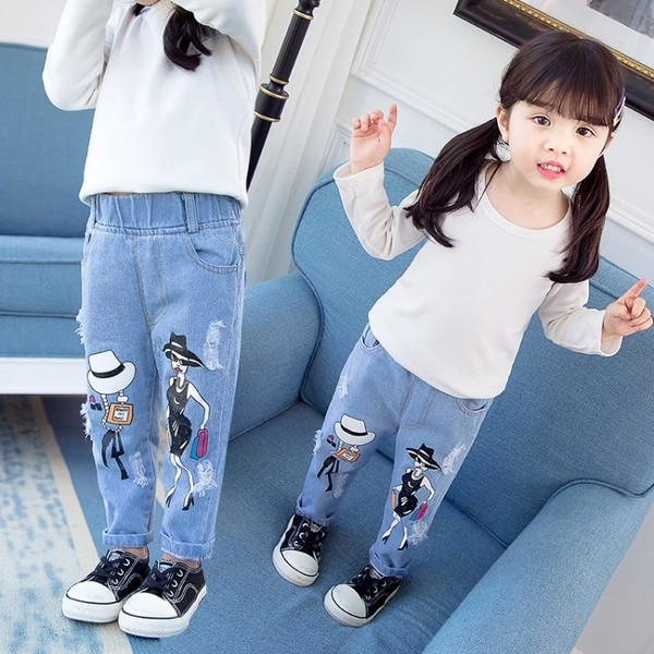 Blugi moderni pentru copii pentru o fata cu aplicatie