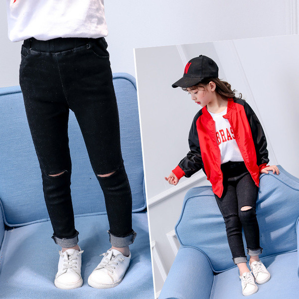 Lezser gyerekfarmer lánynak szakadt motívumokkal, magas derékkal, fekete színben