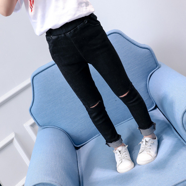 Lezser gyerekfarmer lánynak szakadt motívumokkal, magas derékkal, fekete színben