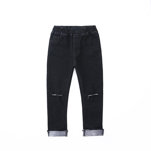 Lezser gyerekfarmer lánynak szakadt motívumokkal, magas derékkal, fekete színben