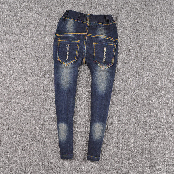 Blugi moderni pentru copii pentru o fată cu perle decorative într-o culoare închisă