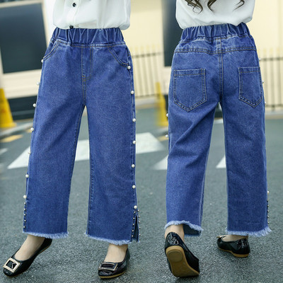 Model larg de blugi pentru copii pentru o fata cu perle decorative