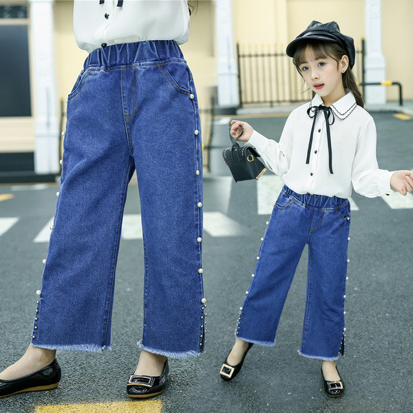 Model larg de blugi pentru copii pentru o fata cu perle decorative