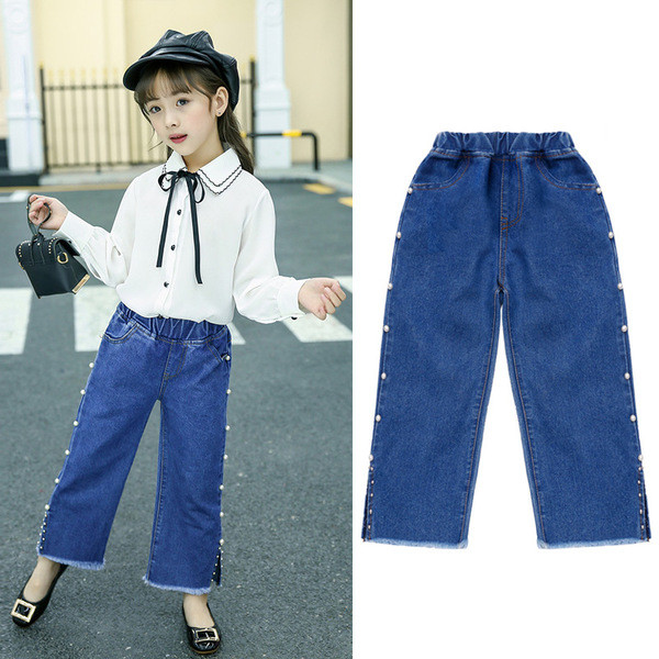 Model larg de blugi pentru copii pentru o fata cu perle decorative