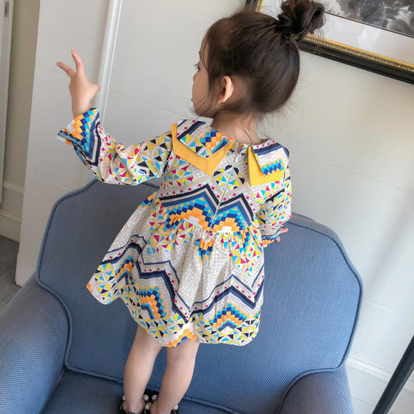 Цветна детска рокля с дълъг ръкав  разкроен модел 