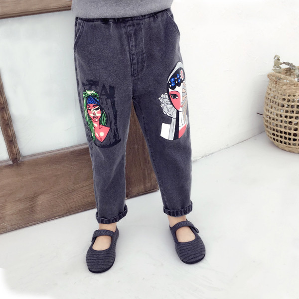 Blugi de copii pentru o fata cu aplicatii in negru si albastru