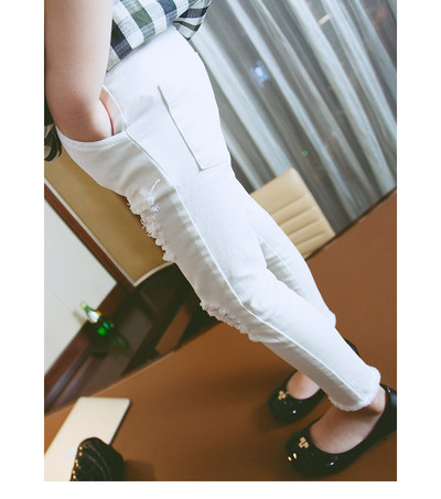 Детски панталон за момиче с разкъсани мотиви в три цвята