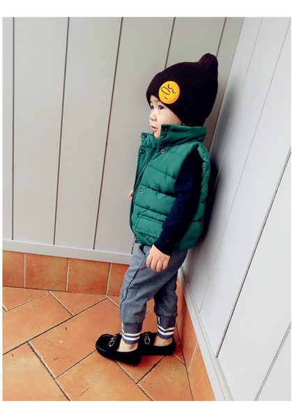 Детски елек в няколко цвята с висока яка и декорация джобове