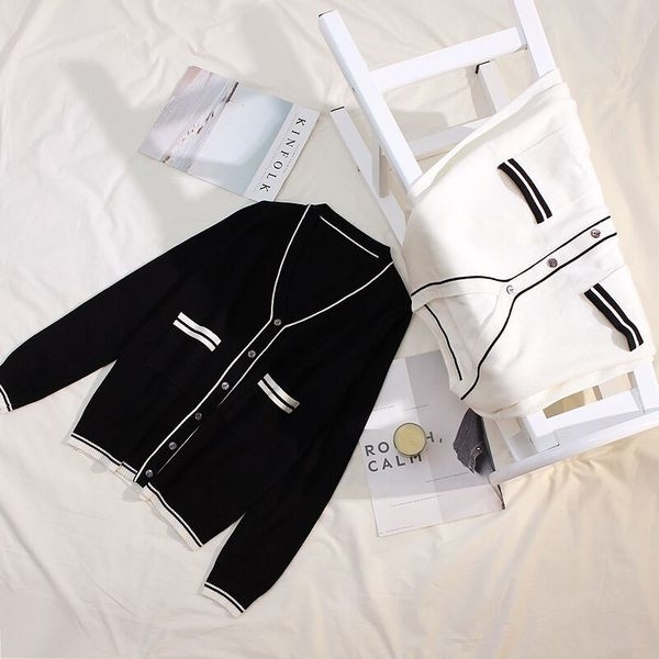 Vesta eleganta de dama in alb si negru