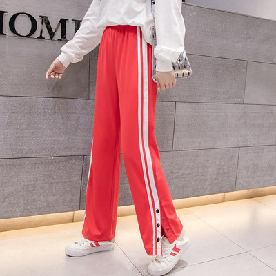 Pantaloni de dama actuali in negru si rosu