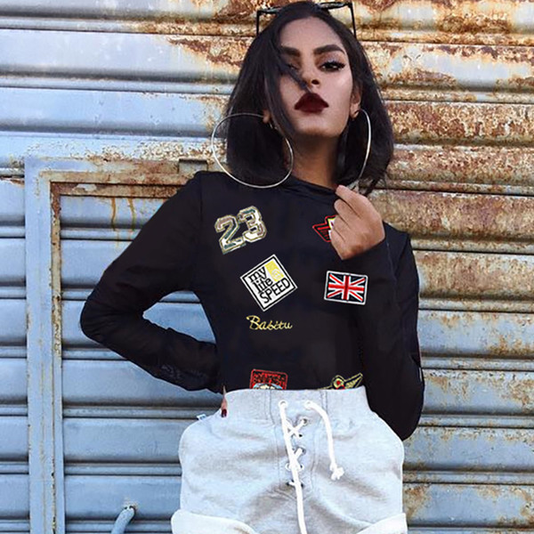 Bluză de damă elegantă din plasă, cu un element de petice colorate