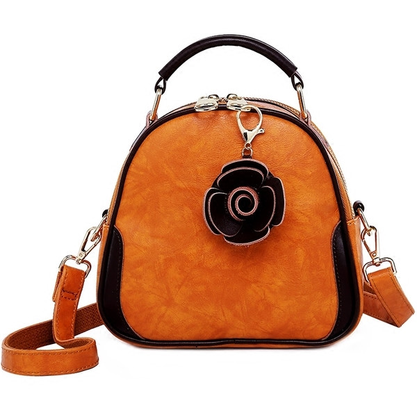 Női bőrtáska több színben virágos motívummal