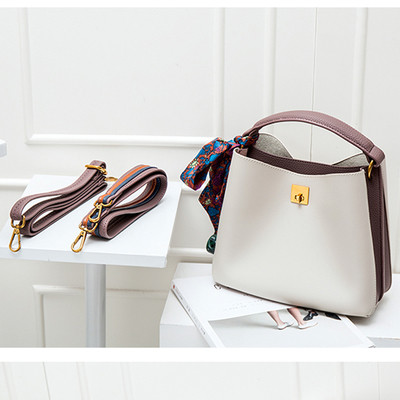 Geanta de dama din piele cu maner colorat