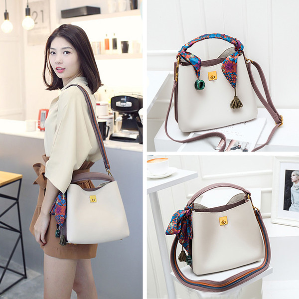 Geanta de dama din piele cu maner colorat