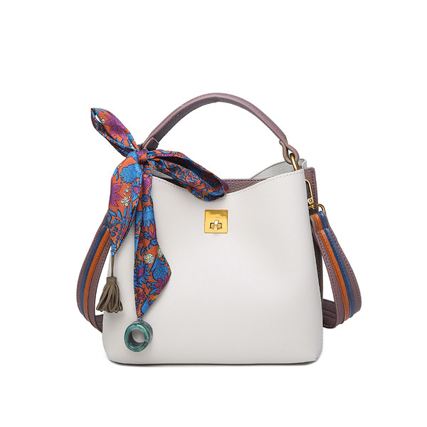 Geanta de dama din piele cu maner colorat