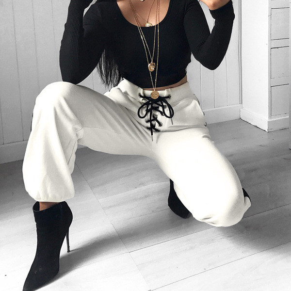 Pantaloni de damă sport-eleganți cu talie înaltă și element-legături