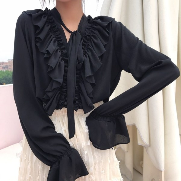 Κομψή γυναικεία μπλούζα με μανίκι λωτού και σύνδεση σε μαύρο χρώμα