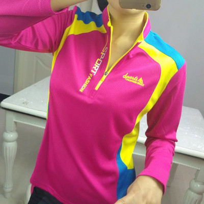 Women`s sports blouse with high collar and zipper