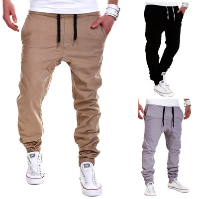 Casual men`s trousers with ties in three colors