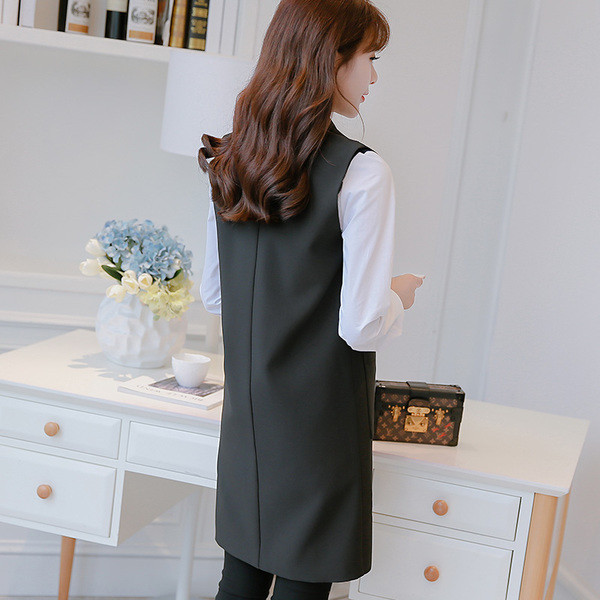 Μακρύ γυναικείο γιλέκο σε μαύρο και μπλε  χρώμα με τσέπες