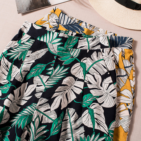 Pantaloni de dama cu motive florale in doua culori