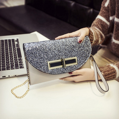 Női kis modern táska brokát huzattal