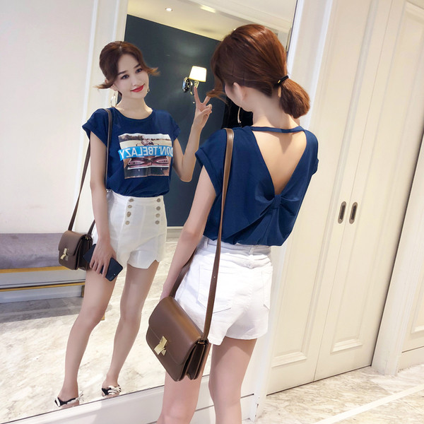 Μοντέρνα γυναικεία μπλούζα σε μπλε χρώμα με ανοικτή πλάτη