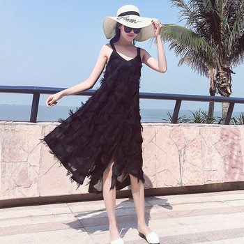 Μοντέρνο γυναικείο φόρεμα σε λευκό και μαύρο χρώμα