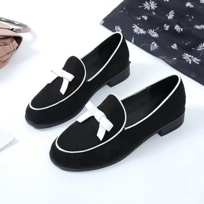 Női mokaszin fekete színben, szalaggal