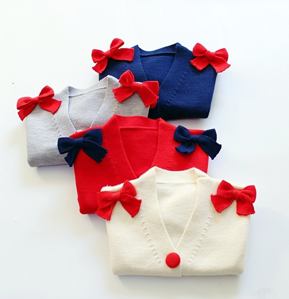 Παιδική ζακέτα  σε διάφορα χρώματα με κορδέλες