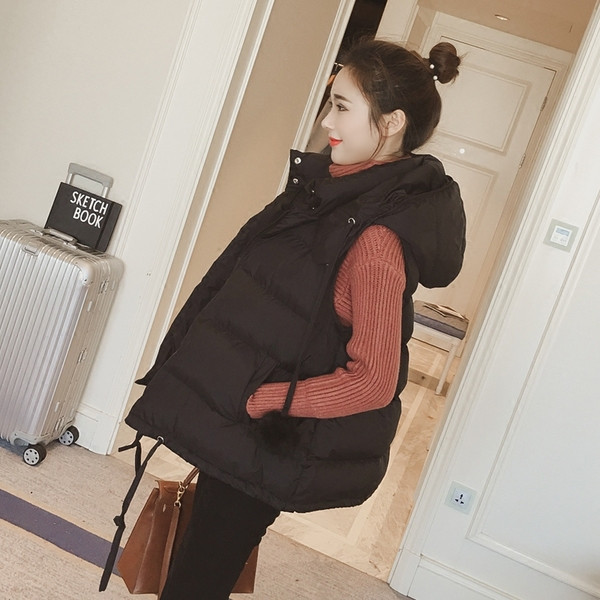 Μοντέρνο γυναικείο γιλέκο με κουκούλα σε μαύρο και άσπρο χρώμα