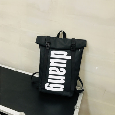 Nagyméretű férfi hátizsák fekete, fehér és narancssárga felirattal