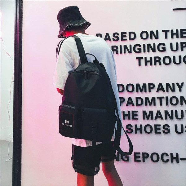 Мъжка раница с предни джобове в четири цвята